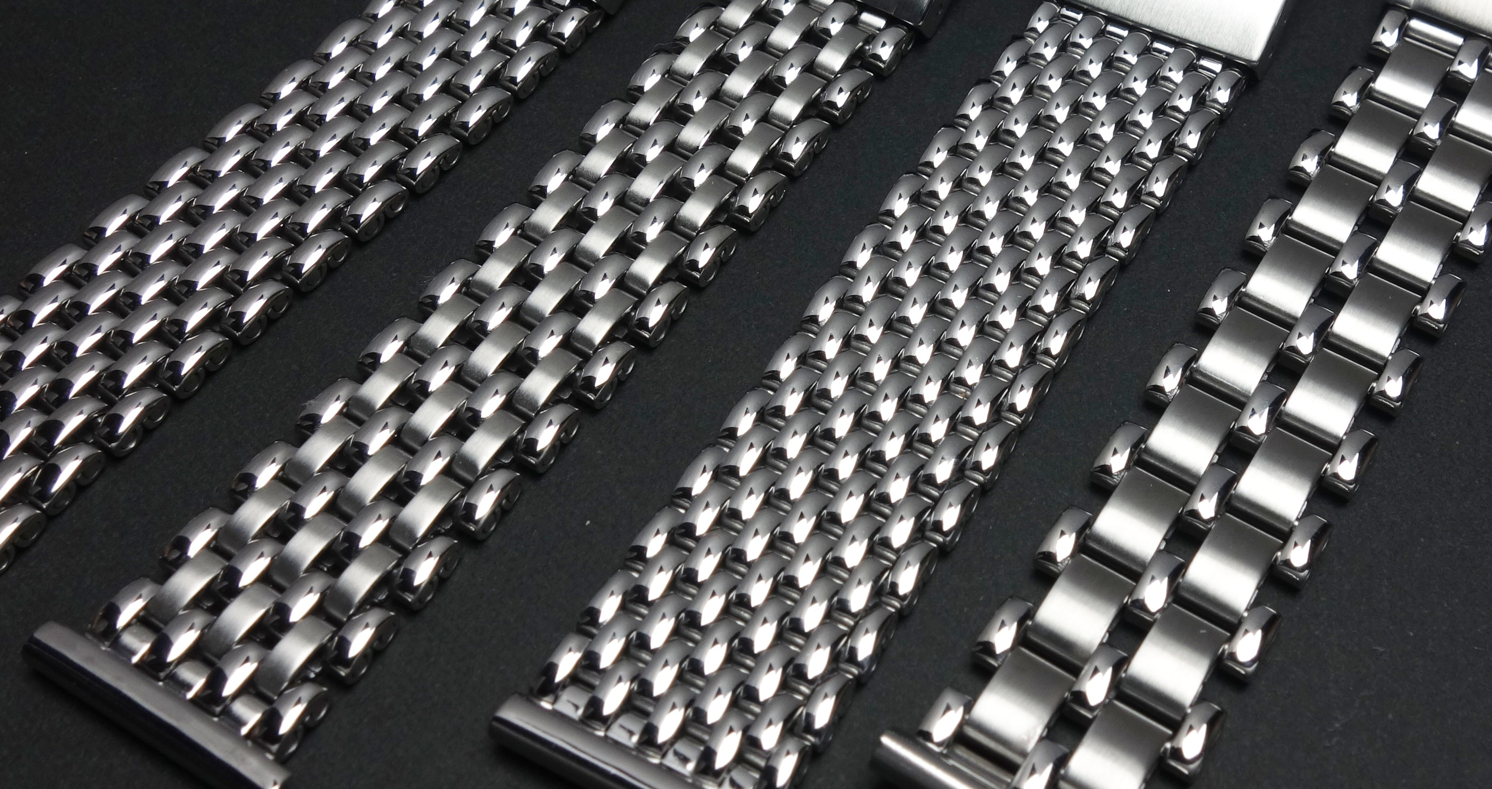 Close-up comparison of four different beads of rice bracelet constructions, showing variation in row count and link shape