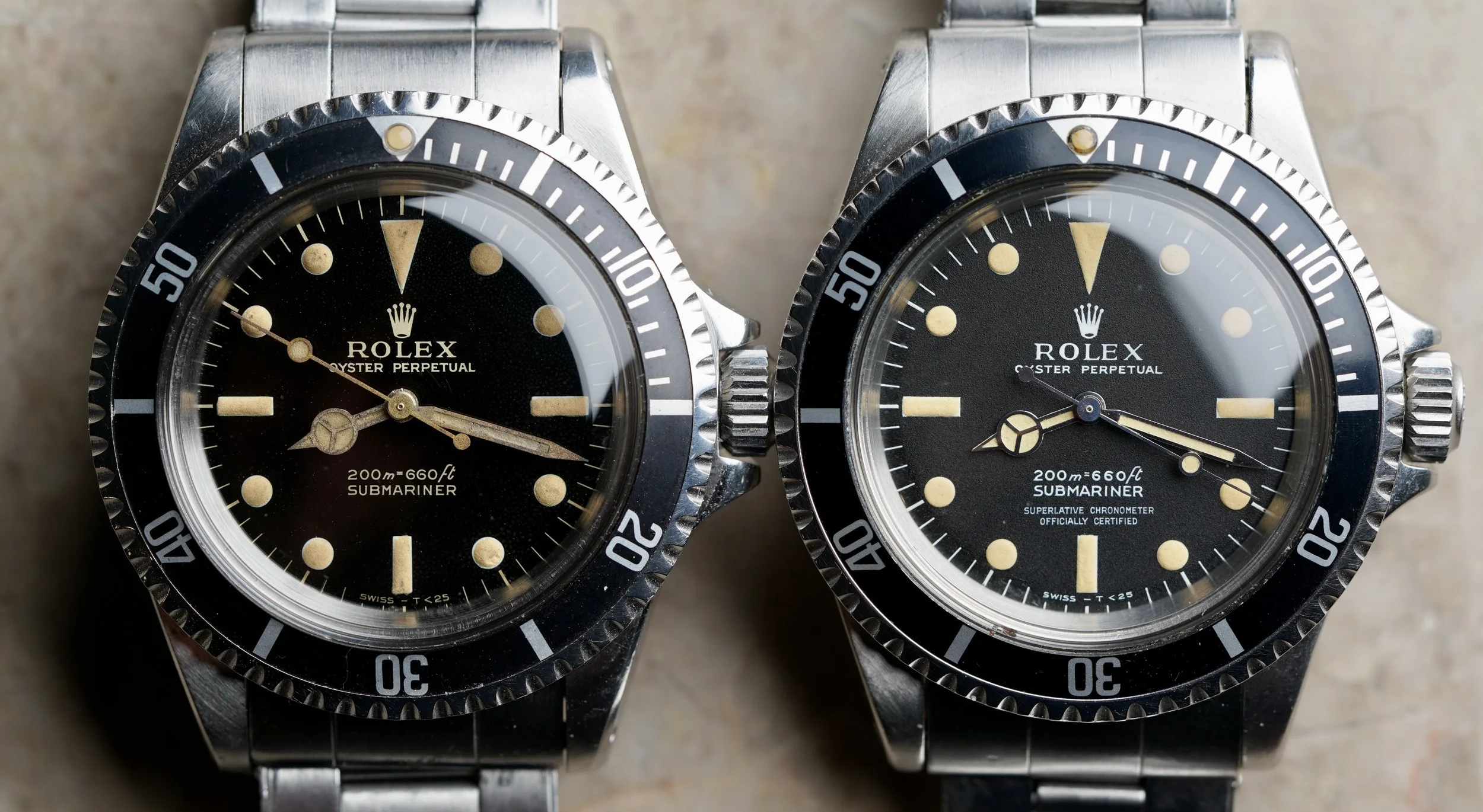Side-by-side comparison of Rolex Submariner Reference 5512 watches with glossy gilt and matte dials
