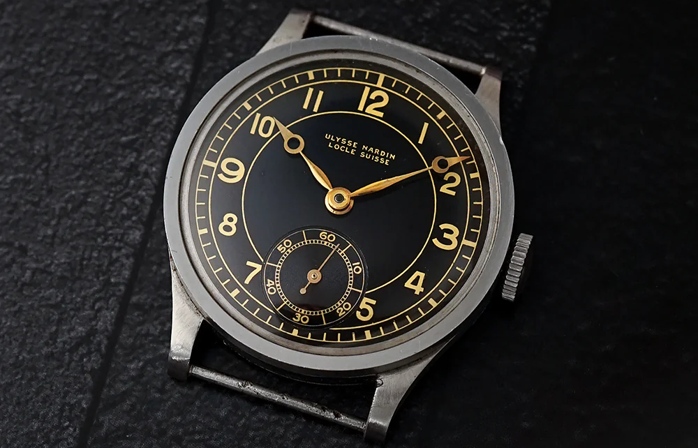 Ulysse Nardin wristwatch with a glossy gilt dial, warm Arabic numerals, minute track and cathedral hands in excellent condition